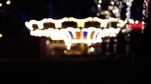 Abstract light carousel at night; Blur Carousel and bokeh of light Video stock 125164778