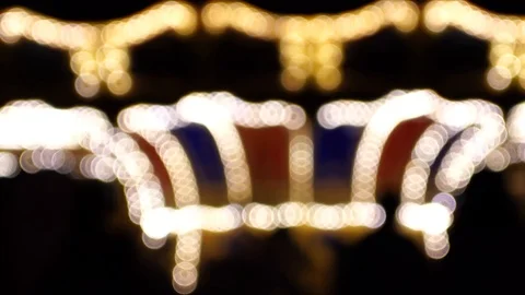 Abstract light carousel at night; Blur Carousel and bokeh of light Stock Footage 125164794