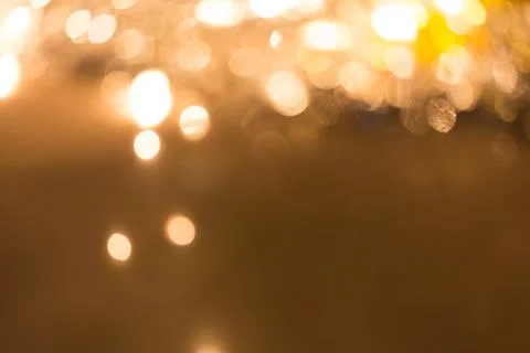 Abstract light celebration background with defocused lights Stock Photos
