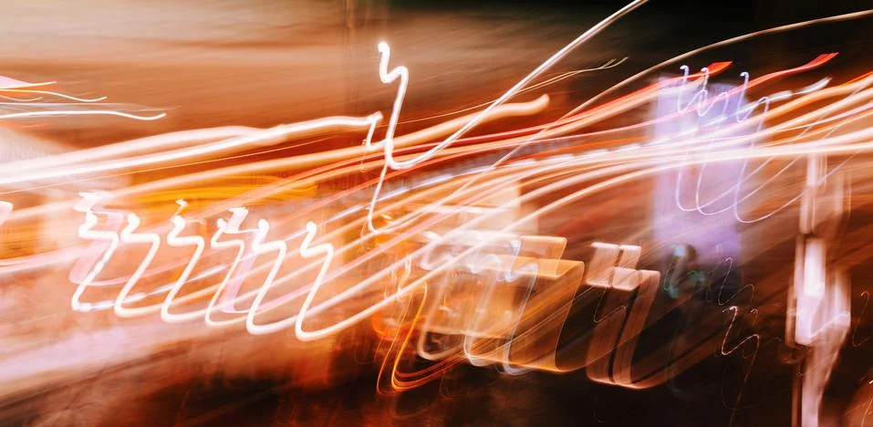 Abstract light drawing pattern on the balck background, night city Stock Photos