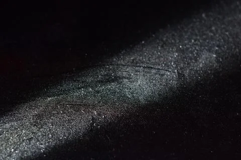 Abstract light from flashlight on a dirty black background Stock Photos