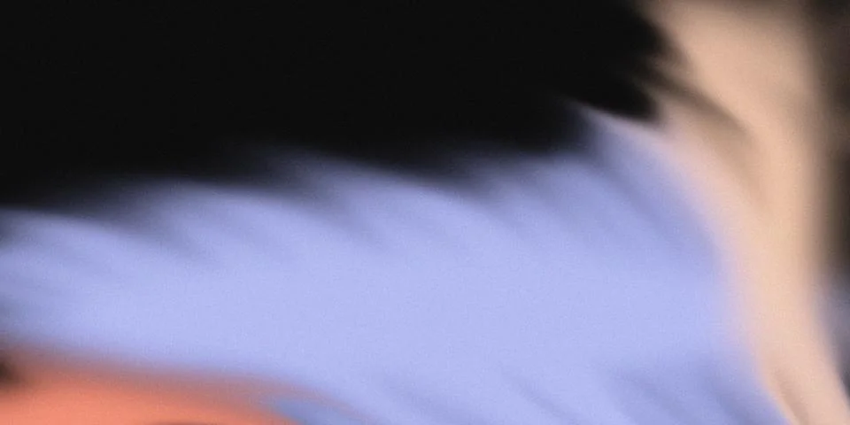 Abstract light flow with motion blur creating a soft grainy purple, orange 스톡 사진