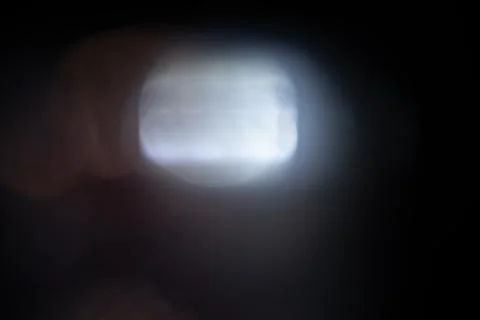 Abstract light leak effect on dark background Stock Photos