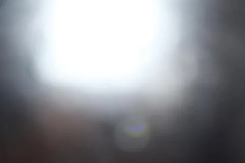 Abstract light leak overlay with soft lens flare and glowing bokeh backgrou.. Stock Photos
