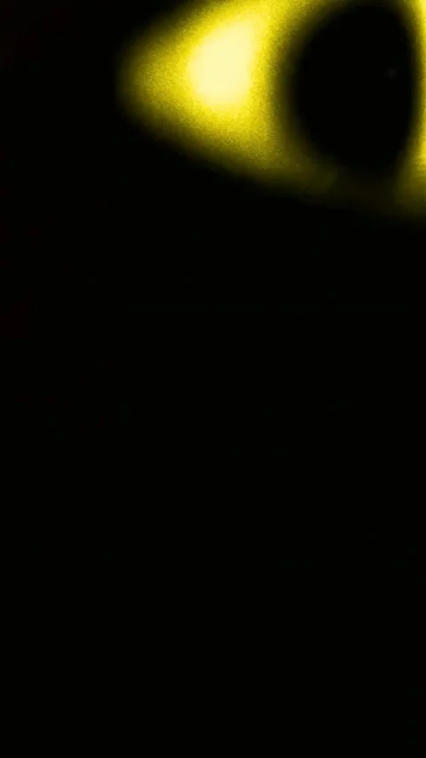 Abstract light leak transition effect with glowing golden particles on a dark Video stock 347485160