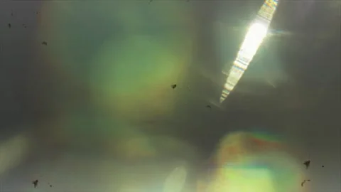 Abstract light leaks and optical flares on dark background for cinematic Video stock 338997005