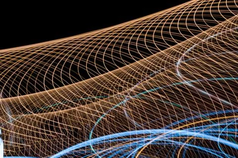 Abstract light line background.Light trails on dark background. Stock Photos