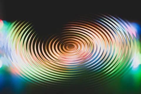 Abstract light multi-color blurred bokeh in the form of a spiral Stock Photos