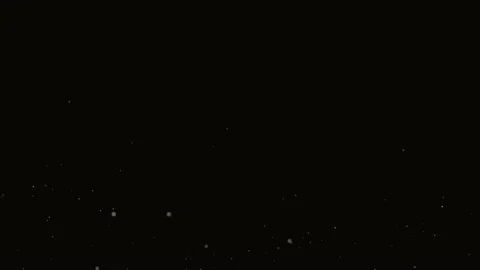 Abstract light particles dancing in dark cinematic motion conceptual elegan.. Stock Footage 340939659