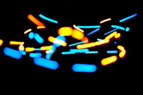 Abstract light particles on dark background Stock Photos