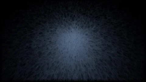 Abstract light particles exploding gently against a dark background with su.. 動画素材 341541781