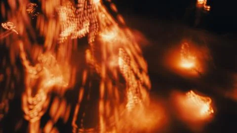 Abstract light patterns with warm orange tones and blurred background effects 스톡 사진