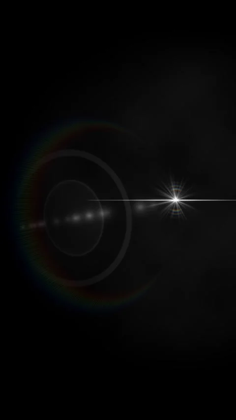 Abstract light with rainbow halo glows against dark background Stock Footage 328567760