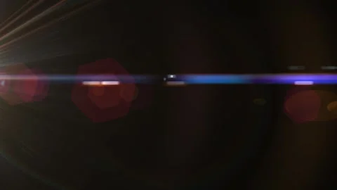 Abstract light rays and lens flare with bokeh effects in dark background Stock Footage 337226352