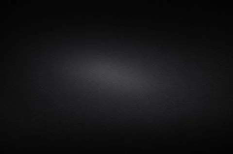 Abstract Light Rays on Black Concrete Background. Dramatic Glowing Light Te.. Stock Photos