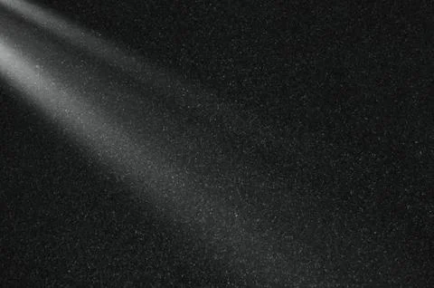 Abstract Light Rays on Black Concrete Background. Dramatic Glowing Light Te.. Stock Photos