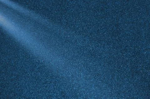 Abstract Light Rays on Blue Concrete Background. Glowing Light Texture Stock Photos