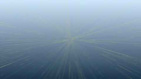 Abstract Light Rays Bursting Through Blue Haze with Subtle Motion Stock Footage 342428594