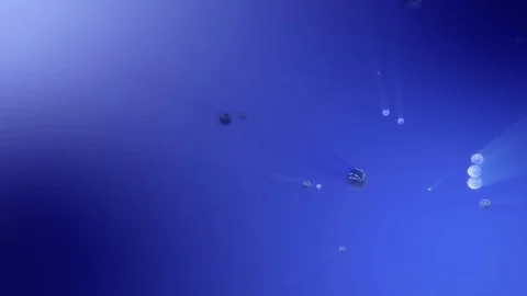 Abstract Light refracting in a rotating blue glass sphere.  Stock Footage 100512382