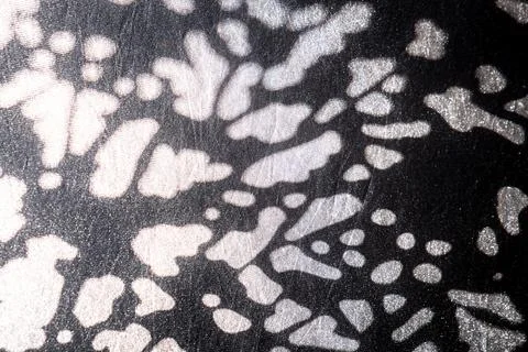 Abstract light spots pattern on dark surface Stock Photos