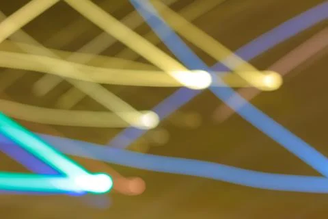 Abstract light trails creating dynamic blurred patterns with slow shutter spe Stock Photos