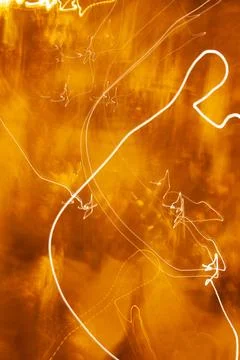 Abstract light trails creating an energetic golden texture Stock Photos