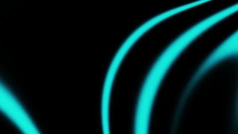 Abstract light trails glow with vibrant cyan curves on a black background 動画素材 340972245