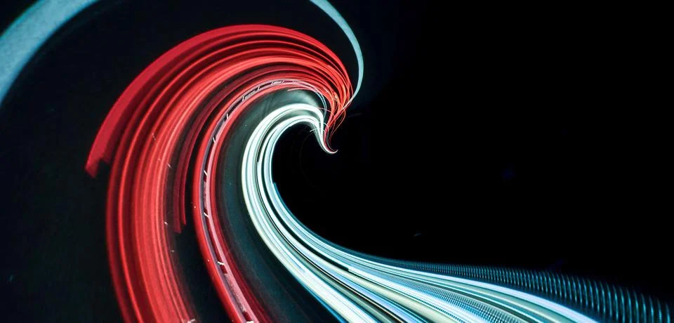 Abstract light wave with red and white neon trails on black Иллюстрация
