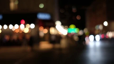 Abstract lights of city traffic at night , bokeh lights of cars driving on bu Stock Footage