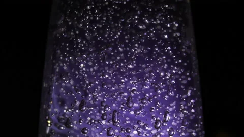 Abstract lights reflection on black background, glares of macro bubbles Stock Footage 147125556