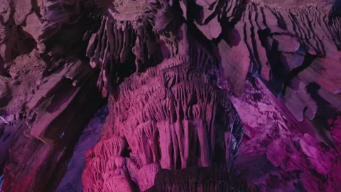 Abstract Limestone Formations in purple light in St. Michael’s Cave Stock Footage 331451249