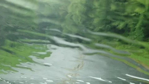 Abstract lines, circles and patterns of wet water rain drops pouring down, Stock Footage 137789836