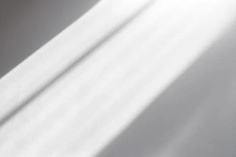 Abstract lines, shadows, light from window on white paper as overlay Stock Photos