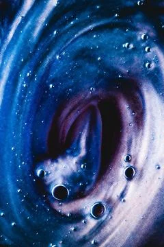 Abstract liquid background, paint splash, swirl pattern and water drops, beauty Foto stock