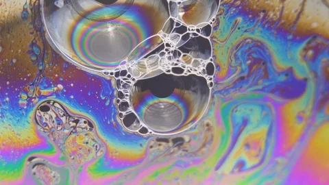 Abstract Liquid Light Forms Colorful Fluid Flow Around Big Bubbles Stock Footage 126719830