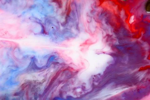 Abstract liquid milk flowing pattern like nebulae in the universe with differ Stock Photos
