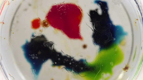 Abstract liquid motion desaturated background texture Stock-Footage 130988565