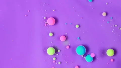 Abstract liquid motion with floating colorful orbs. Vídeo Stock 340459862