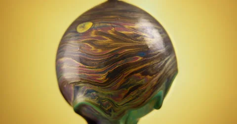 Abstract liquid paint flows in a rotating ball. Fluid art concept. Stock Footage 146175070