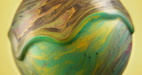 Abstract liquid paint flows in a rotating ball. Fluid art concept. Stock Footage 146188061