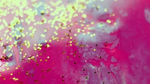 Abstract liquid pink background with gold glitter elements. Stock Footage 135562136
