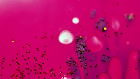 Abstract liquid pink background with gold glitter elements. Stock Footage 138992066