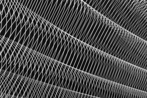 Abstract long exposure blurred light lines black and white background. Geometric Stock-Illustration