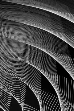 Abstract long exposure blurred light lines black and white background. Geometric Stock Illustration