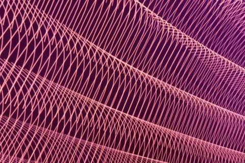 Abstract long exposure blurred light lines black and pink background. Geometric Stock-Illustration