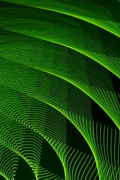 Abstract long exposure blurred light lines black and green background. Geometric Stock Illustration