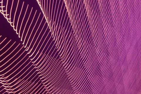 Abstract long exposure blurred light lines black and pink background. Geometric Stock-Illustration