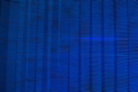 Abstract long exposure blurred light lines black and blue background. Geometric Stock-Illustration
