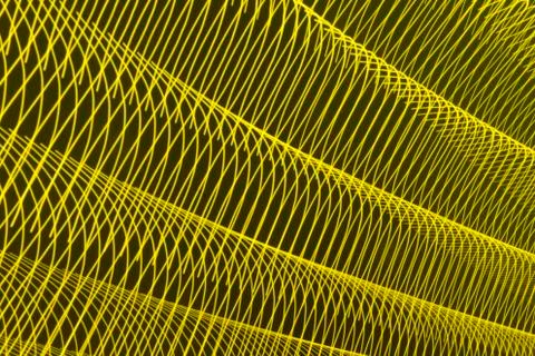 Abstract long exposure blurred light lines black and yellow background Stock-Illustration