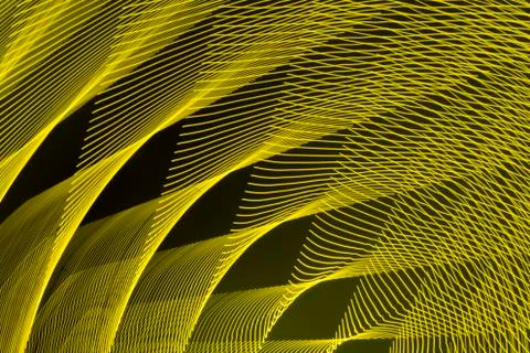 Abstract long exposure blurred light lines black and yellow background Stock-Illustration